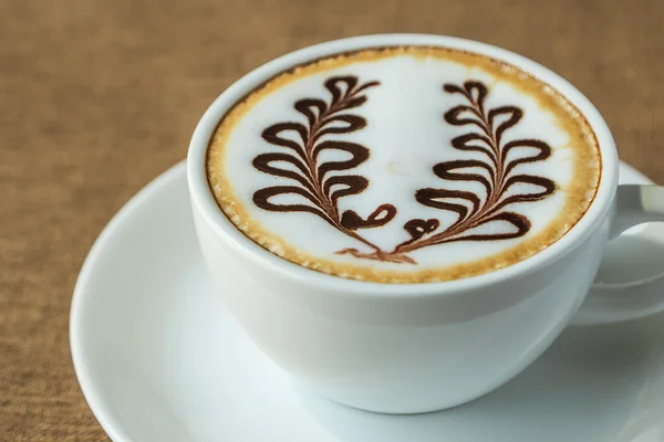 Coffee latte art in coffee shop — Stock Photo, Image