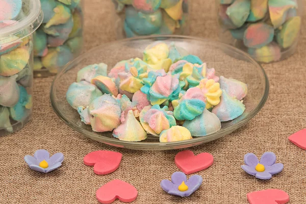 Colorful meringues in dish — Stock Photo, Image