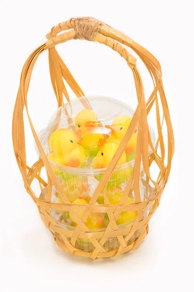 Yellow duck jelly  in a delivery basket — Stock Photo, Image