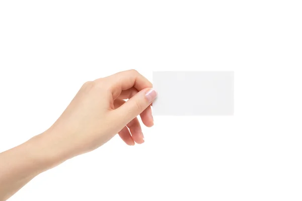 Kvinnlig hand håller vitt kort på en vit bakgrund. — Stockfoto