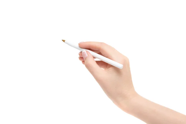Női kéz tart egy tollat, egy fehér háttér. — Stock Fotó