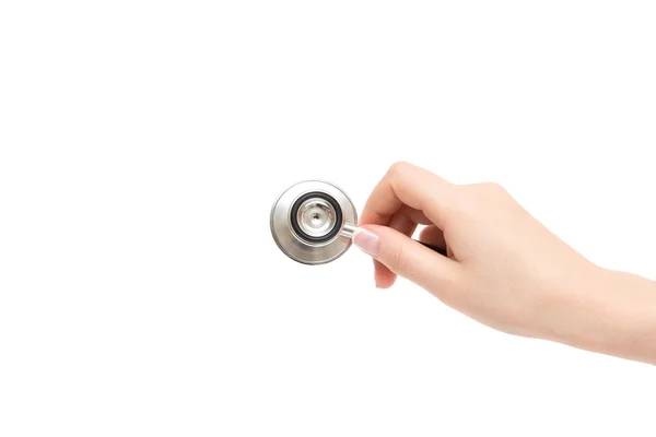 Female hand holds stethoscope on a white background. — Stock Photo, Image