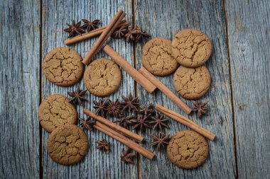 Cinnamon sticks and gingersnap cookies clipart