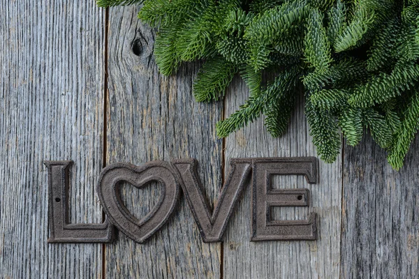 Love for Christmas Text with Pine Branches — Stock Photo, Image