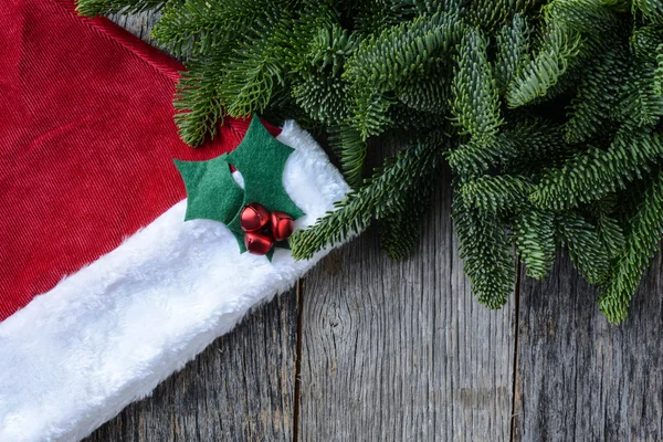 Pine Tree Branches and Santa Hat — Stock Photo, Image