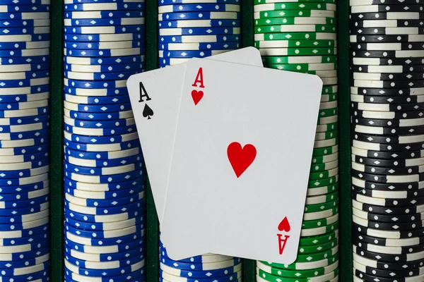 Pair of Aces on a Rows of Betting Poker Chips — Stock Photo, Image