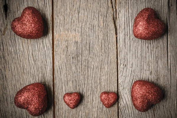 Hearts on Vintage Wood Background for Valentine's Day — Stock Photo, Image