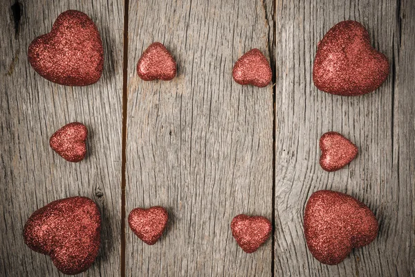 Hearts on Vintage Wood Background for Valentine's Day — Stock Photo, Image