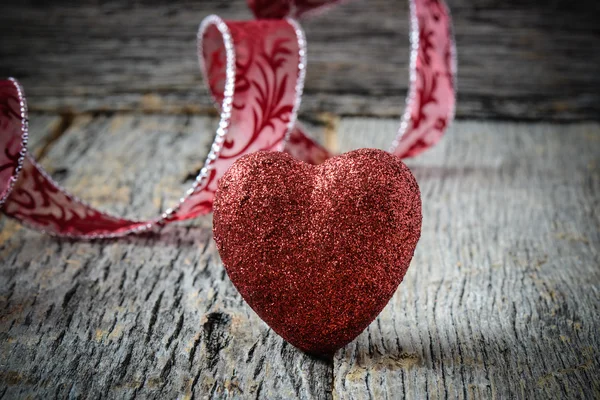 Heart with Ribbon on wooden Background — Stock Photo, Image