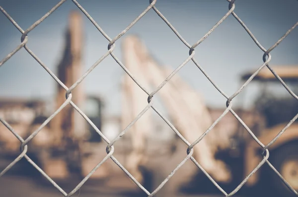 Excavator in vintage film style — Stock Photo, Image