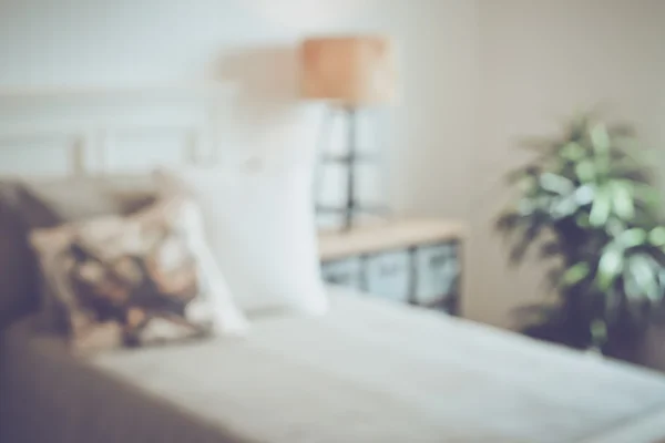 Camera da letto sfocata con letto — Foto Stock