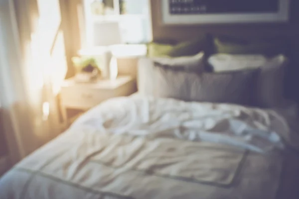 Suddig sovrum med säng — Stockfoto
