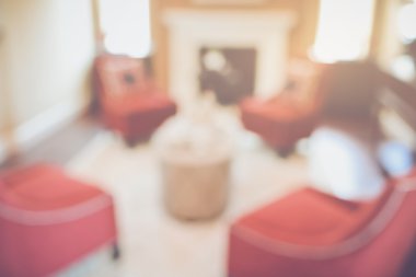 Blurred Living Room with Red Chairs  as background