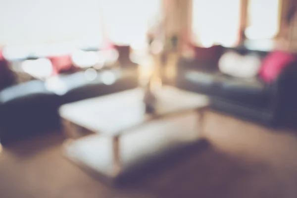 Sala de estar desfocada com sofás como fundo — Fotografia de Stock