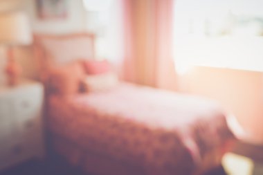 Blurred Bedroom with Bed as background