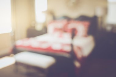 Blurred Bedroom with Bed as background
