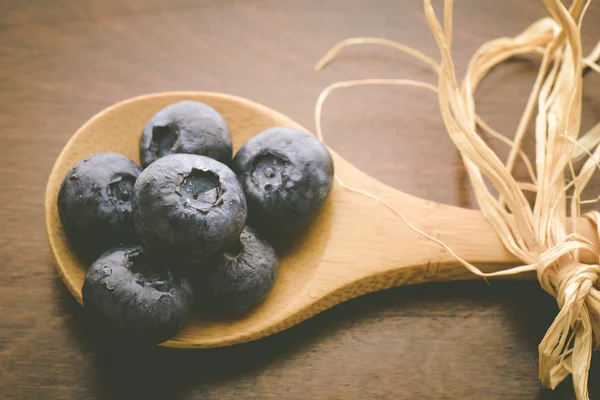 Fresh Blueberries on spoon — Stock Photo, Image