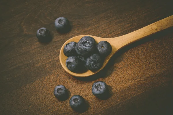 Fresh Blueberries on spoon — Stock Photo, Image