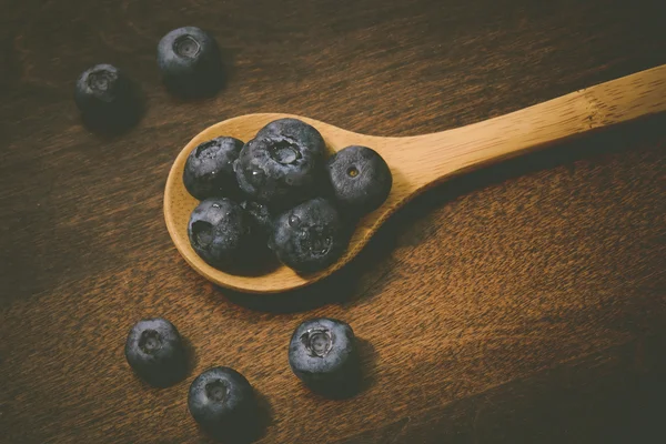 Fresh Blueberries on spoon — Stock Photo, Image