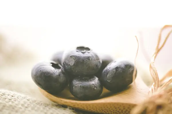 Fresh Blueberries on spoon — Stock Photo, Image