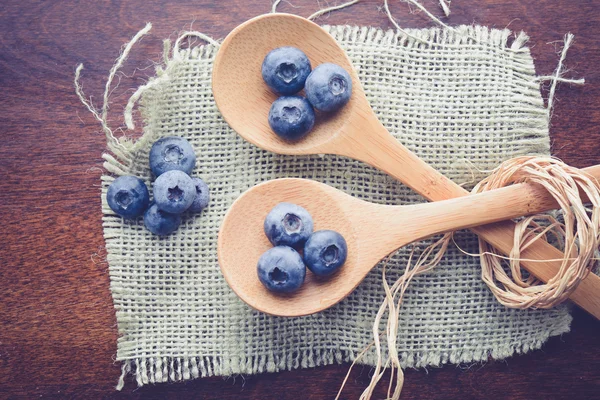 Fresh Blueberries on spoons — Stock Photo, Image