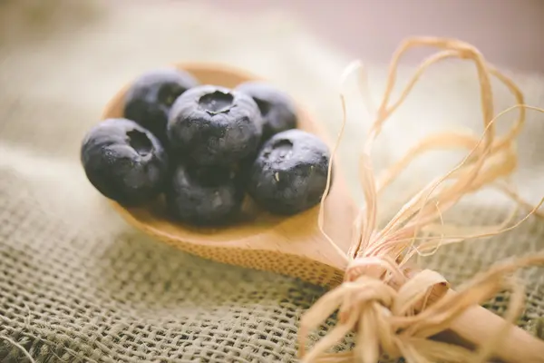 Fresh Blueberries on spoon — Stock Photo, Image