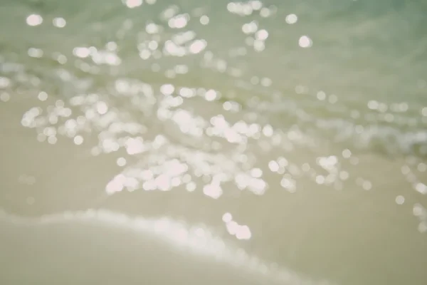 砂の上のぼやけた水 — ストック写真