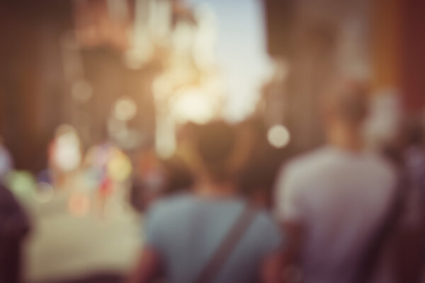 Blurred People in a Street on a Summer Day
