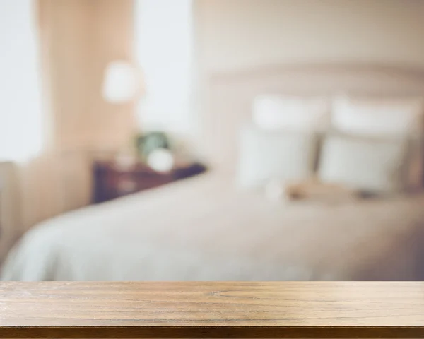 Blurred bedroom with bed — Stock Photo, Image