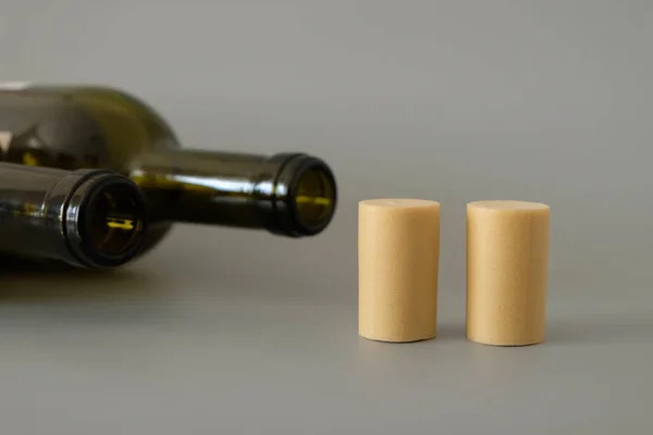 Two Synthetic Wine Corks Background Empty Bottle Gray Surface Copy — Stock Photo, Image