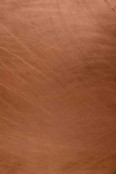 Copper background. Scraped copper sheet. Copy space.