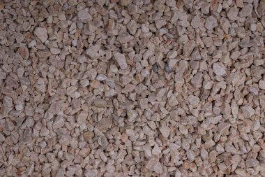 Pembe ezilmiş taşlar arka planda. Tasarım için doğal taşlar.