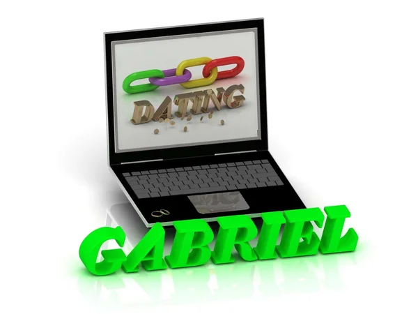 Gabriel - ім'я та сім'ї яскравими літерами поблизу ноутбук — стокове фото