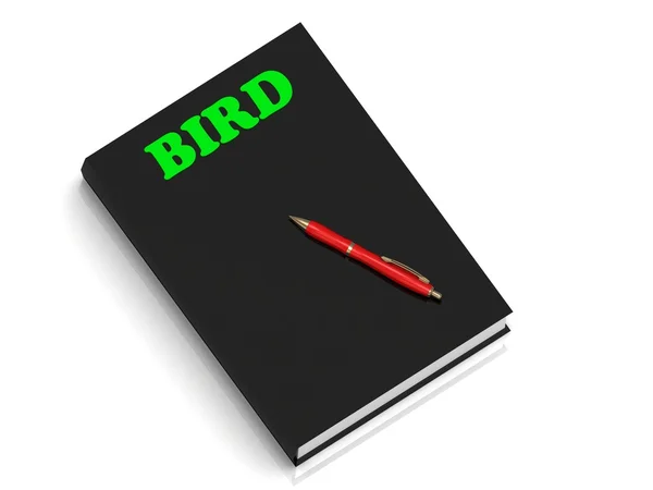 Ptak napis zielone litery na czarna księga — Zdjęcie stockowe
