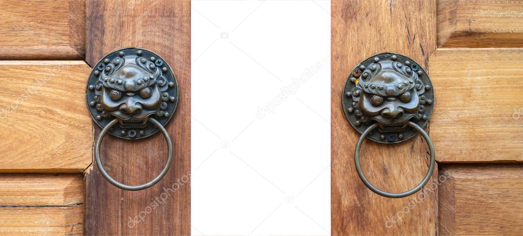 Close up on Asia, China Bronze - Metal twin LION style the knocked wood door is slided open up with solid white background. Clipping Path.