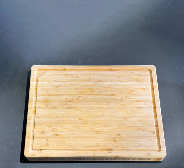 Wooden Cutting Board Black Stone Flat Surface Background — Stock Photo, Image