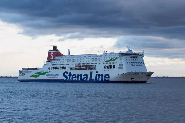 stock image Port of Felixstowe, ferry Stena Hollandica steaming through the harbour at dusk