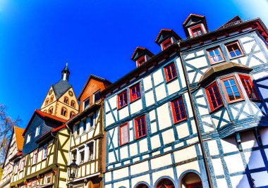Historic wood-framed houses in Barbarossa town Gelnhausen, the geographic center of the European Union in 2010, Germany clipart