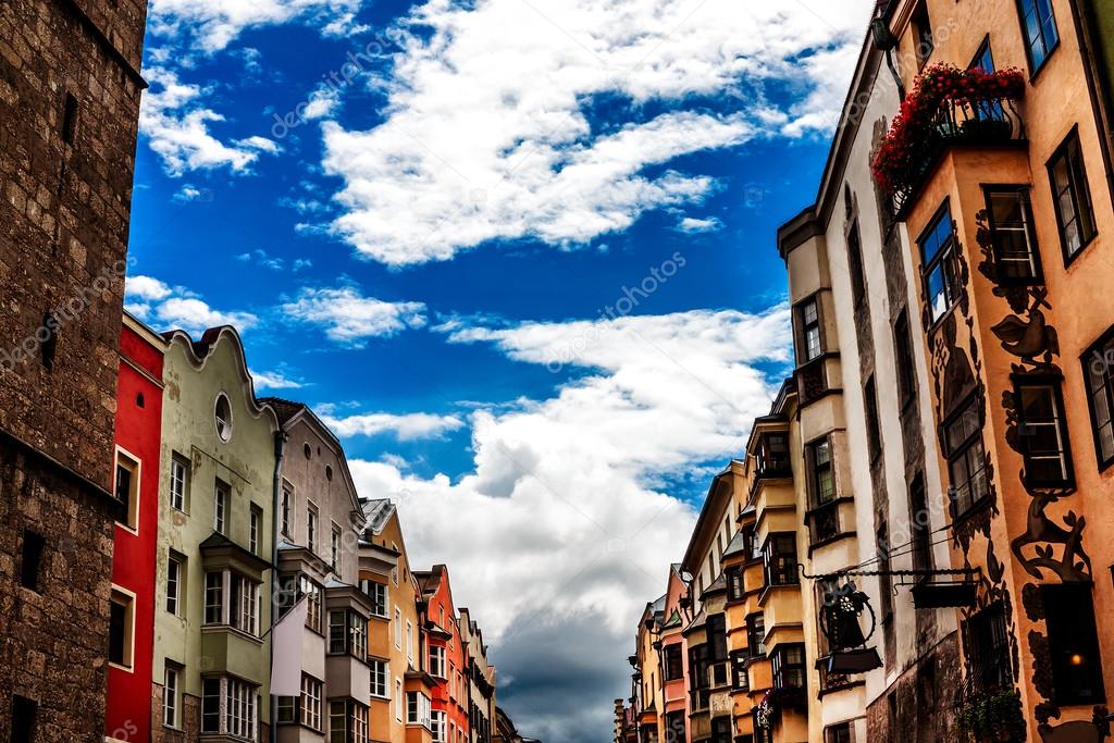 Colorful row of houses close to the city tower in Innsbruck, Austria