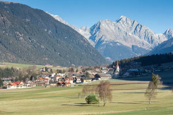 Mountain landscape with a little town — Stock Photo, Image