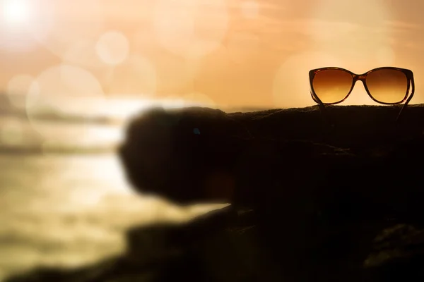 Sunglasses at Sunset and Defocused Horizon — Stock Photo, Image