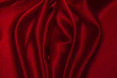 Red silk or satin luxury fabric texture can use as abstract background. Top view clipart