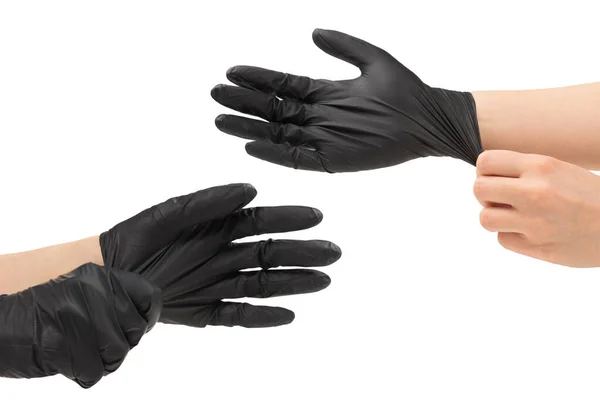 Frau Zieht Schwarze Gummihandschuhe Isoliert Auf Weiß — Stockfoto