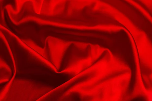 红色丝绸或缎子的奢侈面料质感可以用作抽象的背景 顶部视图 — 图库照片