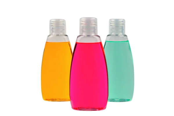Four Plastic Bottles Liquid Yellow Green Red Soap — Stock Photo, Image