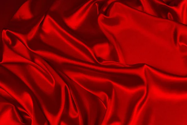 stock image Red silk or satin luxury fabric texture can use as abstract background. Top view.