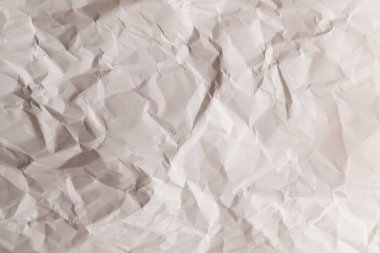 Buruşmuş beyaz kağıt arka plan. Üst görünüm. 