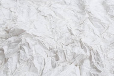 Buruşmuş beyaz kağıt arka plan. Üst görünüm. 