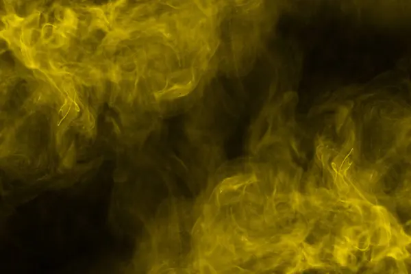 黒い背景に黄色の蒸気 スペースのコピー — ストック写真