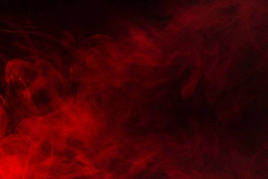 Siyah arka planda kırmızı buhar. Boşluğu kopyala.